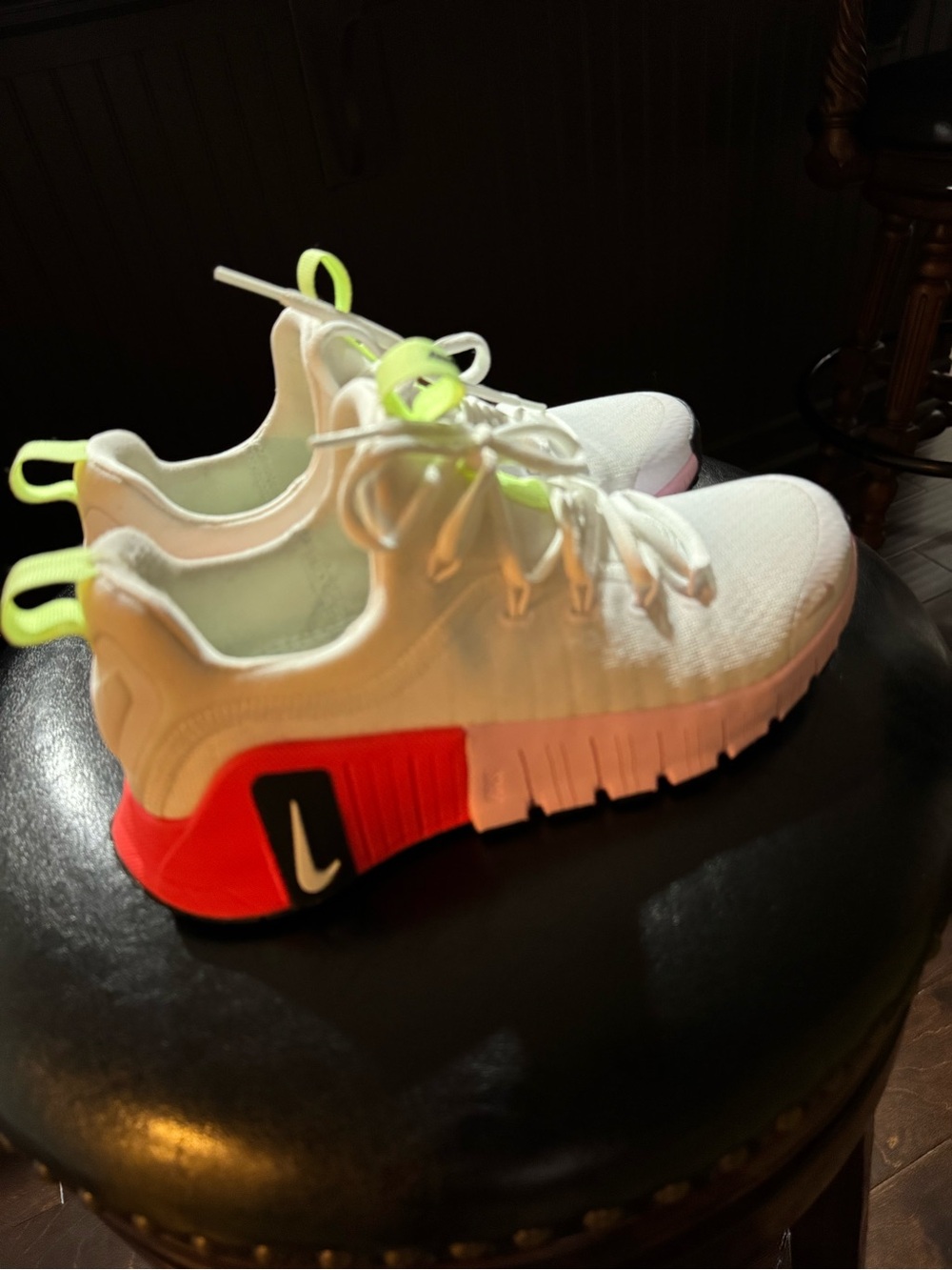 Nike White Sneakers with Neon Green Pull Tabs and Red Heel Accent